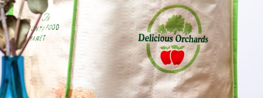 Delicious Orchards shopping tote filled with product
