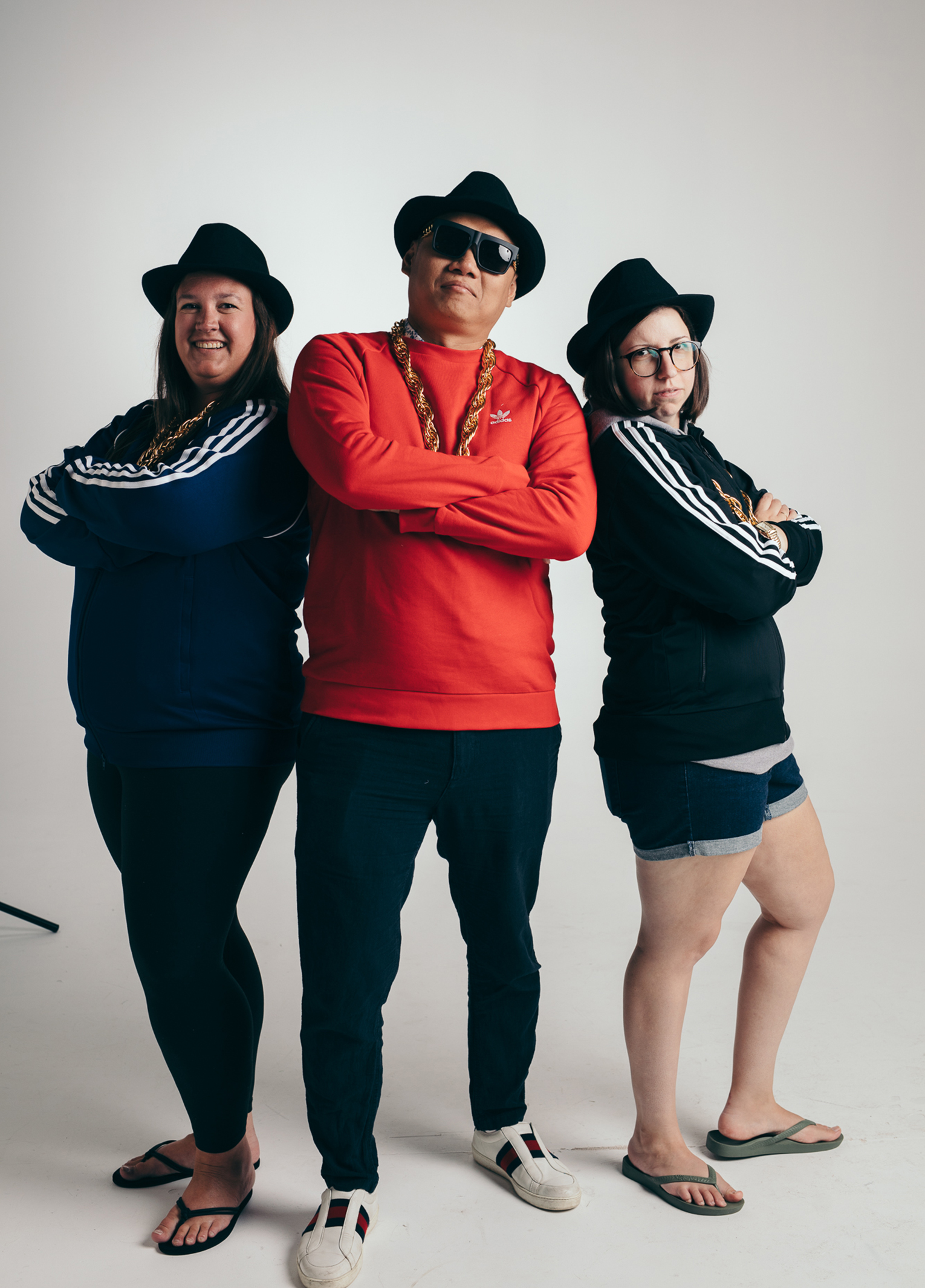 Three people posing for a photo.