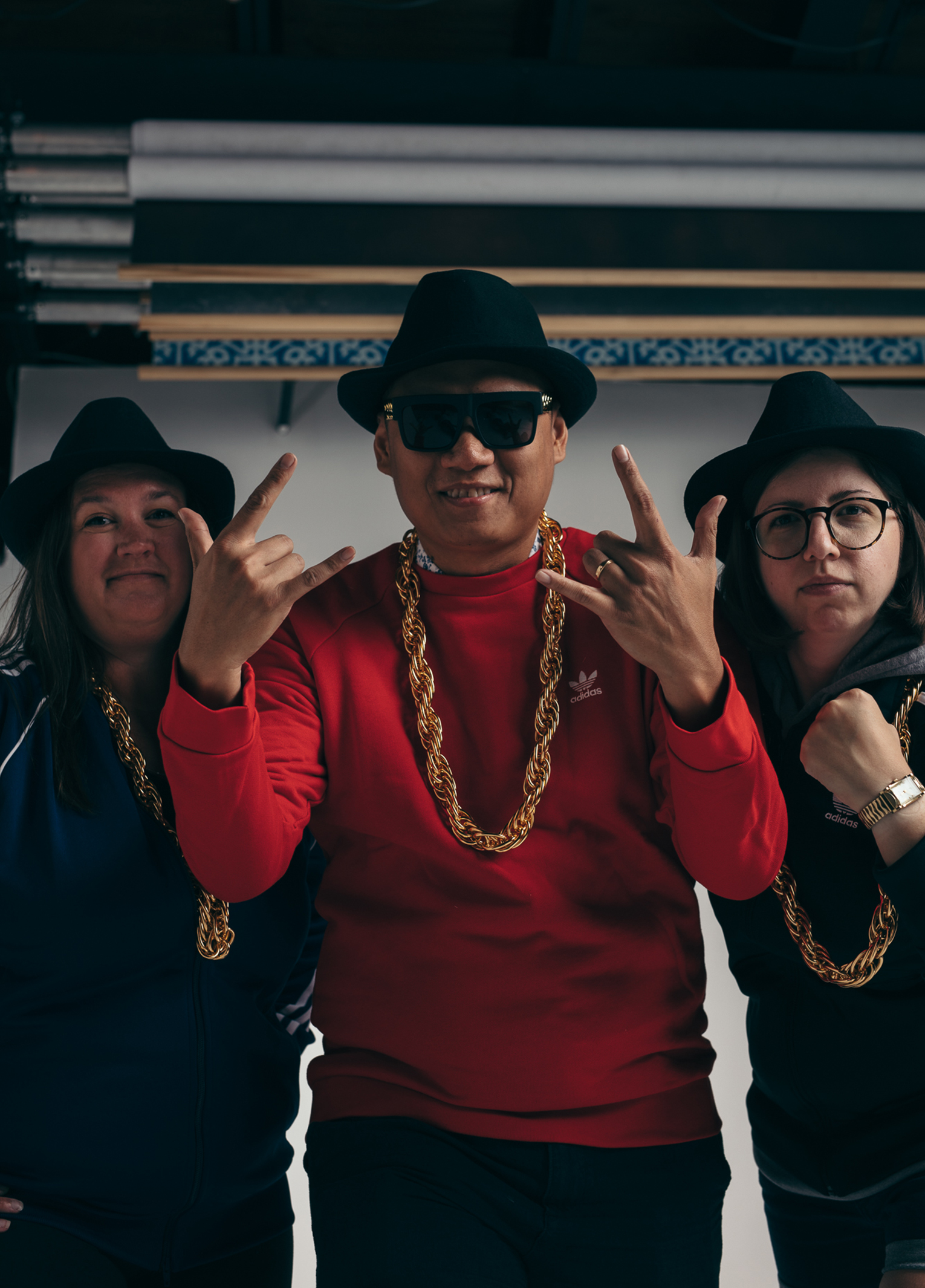 Three people posing for a picture.