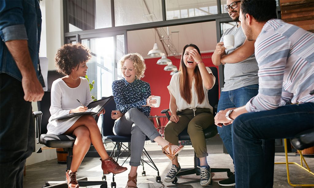 Group of young business professionals having a meeting