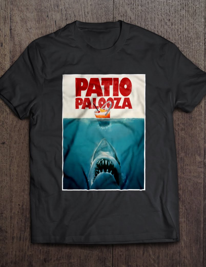 Patio Palooza Jaws Theme Poster on a black t-shirt